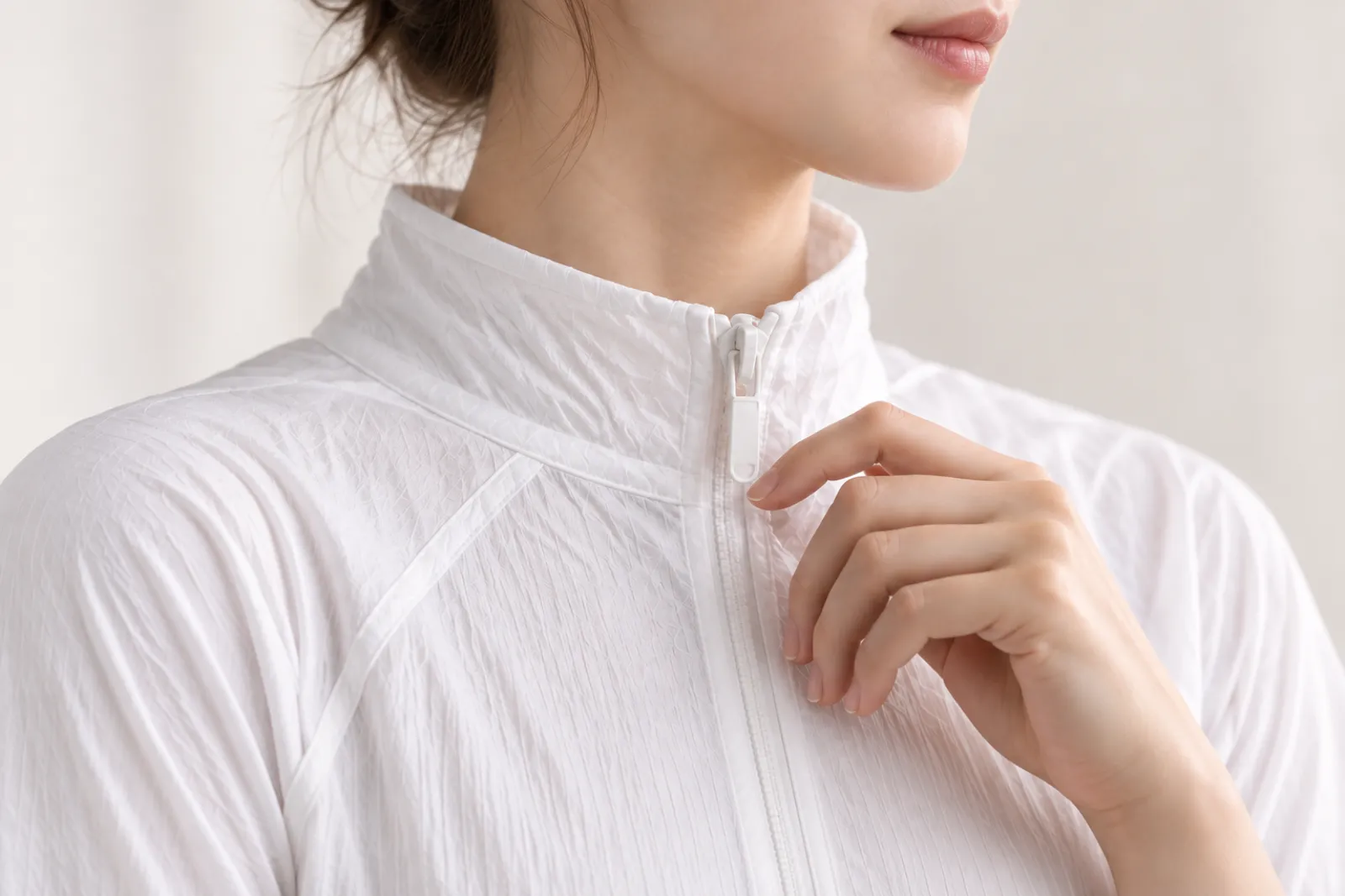 High collar and front zipper of the MIUF Wearable Body Mask